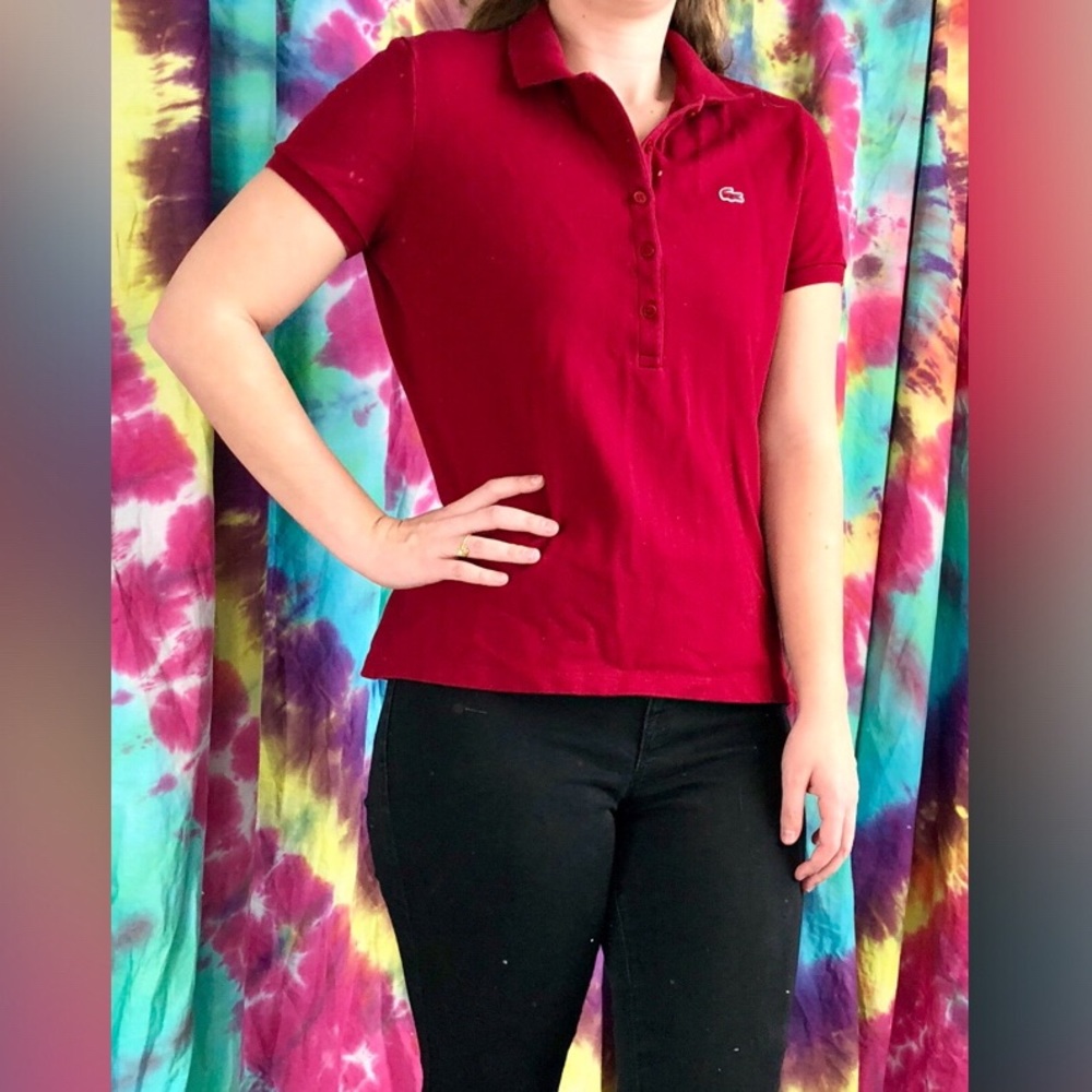 Red Lacoste collared shirt. Short sleeve.